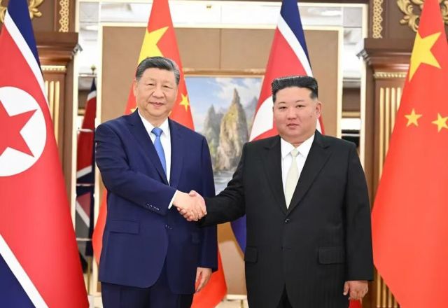 习近平同金正恩举行会谈